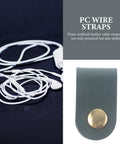 Premium Faux Leather Cable Organizer Straps For Earphones And Usb Cables on black background with white earphones.