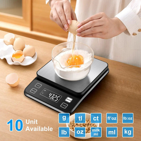Waterproof Kitchen Scale IPX67 with 0.1g precision displaying 4.325 units as eggs are cracked into a bowl on stainless steel platform