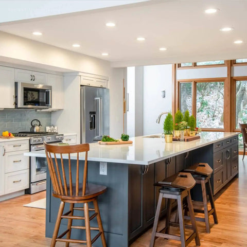 Modern kitchen with 6 Inch White Recessed Light Trim With Detachable Ring And Step Baffle illuminating wooden island and seating area