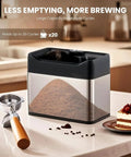 Elite Electric Portafilter Cleaner For Coffee Grounds Shakes Pucks Loose In A Flash With Dual Spin Brushes Plus The Matched Knock Box Included No Sweat with coffee grounds and portafilter on a kitchen countertop.