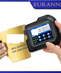 Snazzy 0.5 Inch Portable Mini Touchscreen Inkjet Printer For Quik QR Barcode And Expiration Date Labels in use on a coffee mug.