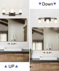 Dope 3 Light Bathroom Vanity Light In Dark Bronze With Dual Glass Shades Hardwired Indoor Wall Mount Fixture Up Or Down Light shown above mirror.
