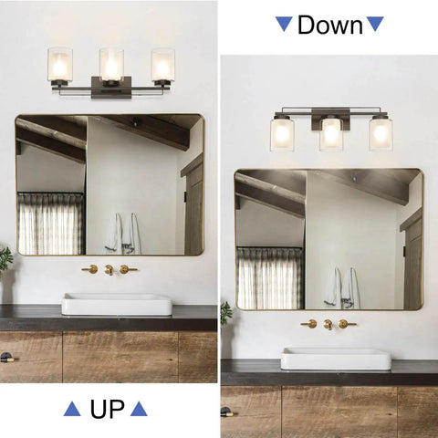 Dope 3 Light Bathroom Vanity Light In Dark Bronze With Dual Glass Shades Hardwired Indoor Wall Mount Fixture Up Or Down Light shown above mirror.