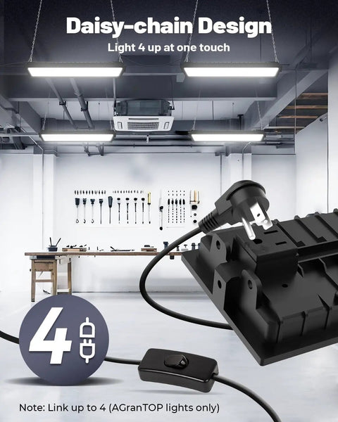 Four Pack Linkable LED Shop Lights With Built In Outlet 100W 15000LM Aluminum Garage Lighting shown in ceiling installation
