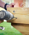 Person using power tool on deck with 5/16 Inch By 5 Inch Exterior Washer Head Structural Wood Lag Screws With Torx T-Star Drive, 50 Count.