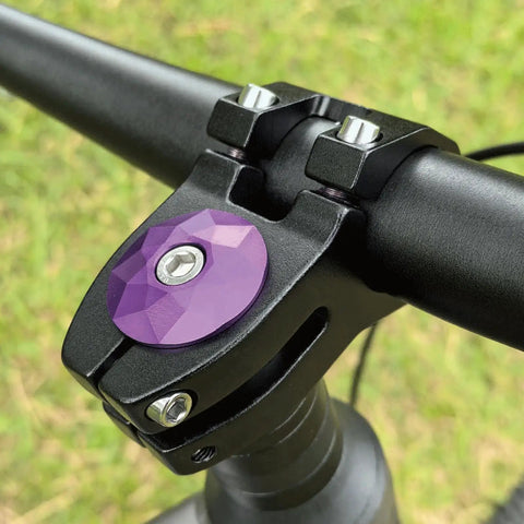 Close-up of a Short 45mm MTB Bike Stem for 25.4 and 31.8 Clamp, 4 Bolt Aluminum Handlebar Stem With 28.6 Steerer, installed on a bike.