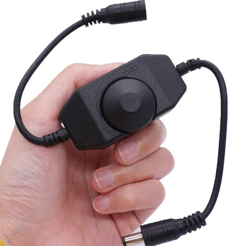 2 Pack DC 12V To 24V Rotary PWM Dimmer Switch For LED Strip Lights held in hand showcasing the smooth dial and connectors.