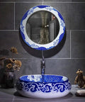 Slick Oval Vessel Sink For Bathroom Vanity Top Notch Premium Porcelain Countertop Wash Basin Featuring Hand Painted Lotus Bird Motif And Smooth High Gloss Finish in elegant bathroom setting.