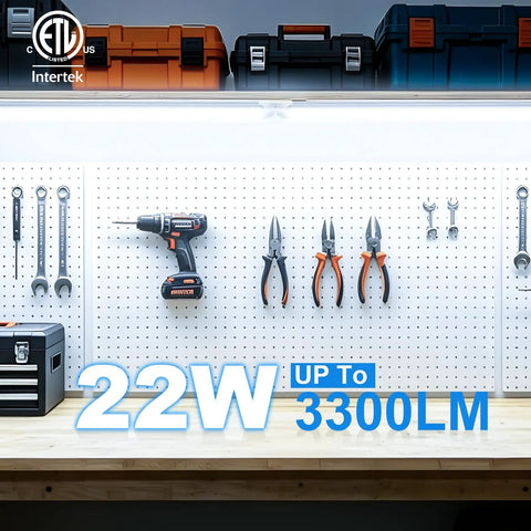 Lit 2 Foot LED Shop Light Kit 22W 3300 Lumens 6000K for Workbenches with tools on a pegboard and storage boxes above