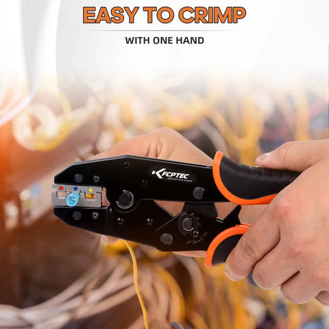 Close-up of hand using Five In One Ratchet Wire Crimping Tool Kit With Quick Change Jaws For Heat Shrink Insulated And Non Insulated Connectors Ferrules Open Barrel OT And UT Terminals Includes Sturdy Storage Case on orange wires.