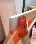 Heavy Duty Cut Off Saw Horse Brackets 2 Pack Cold Rolled Steel Mechanical Workbench Jacks with wood plank secured for cutting.