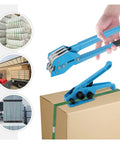 Heavy Duty Strapping Machine With 1000N Tension And 400Kg Break Strength being used on a cardboard box in a warehouse.