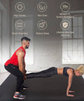 Two people exercising on Extra Wide Exercise Mat For Home Gym Flooring Non Slip Durable Cardio Mat Great For Plyo MMA Jump Rope And Weight Training 6x4 6x5 Or 6x6 7mm Thick Shoe Friendly Indoor Or Outdoor Use in a home gym.