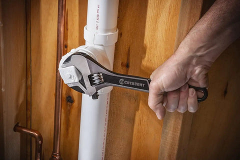 Wide Jaw Adjustable Wrench Set With 6 Inch And 10 Inch Wrenches used on plumbing, showing micro serrations for precise grip.