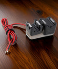 Slick Split Core Current Transformer Clamp Sensor With 50A To 200A Rating And 5A Output, featuring dual clamps and low resistance leads.