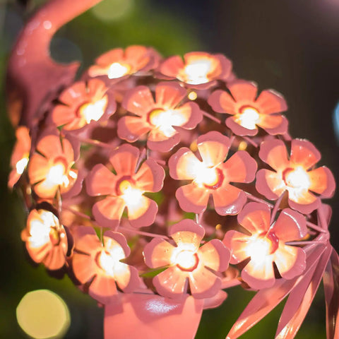 Close-up of pink floral detail on Flamingo Solar Garden Lights 27 LED Warm White Outdoor Stake Light Waterproof For Lawn Patio Courtyard