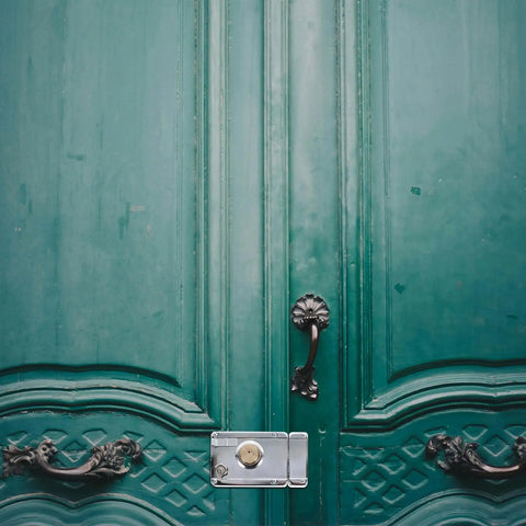 Heavy Duty Stainless Steel Front Door Safety Lock Set Featuring A Beefy Crescent Deadbolt For Foolproof Installation on a teal door.