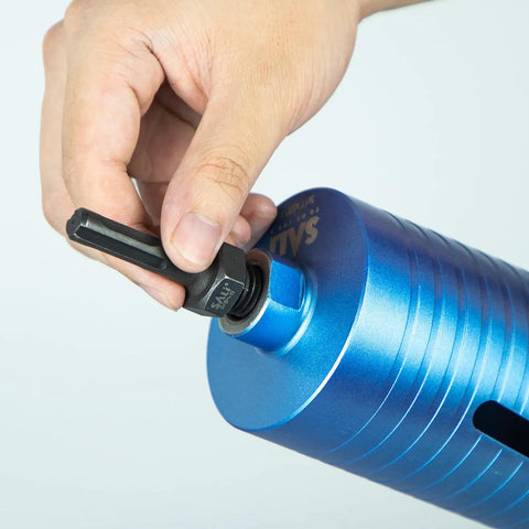 Hand inserting 2 Pack Core Drill Bit Adapters 5/8-11 Thread To 3/8 Inch Triangle Shank into a blue drill chuck