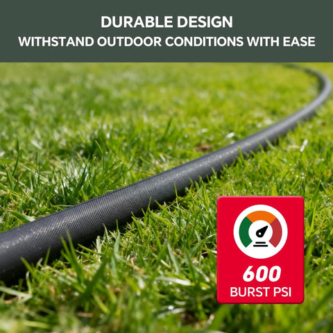 Garden hose, black and gray, side view on grass with 600 PSI burst badge