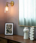 Industrial Vintage Sconce With Oval Cone Clear Glass Shade 1 Light Wall Light In Antique Gold Finish in modern living room