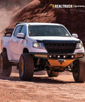 Chevy Colorado with Superlift 1.25 Inch Leveling Kit For Chevy Colorado And GMC Canyon With Strut Spacers Easy Bolt On Lift 2015 To 2022 Fit Does Not Fit ZR2 Models Made In USA Performance Ready Suspension Upgrade For All Terrain And Daily Driving on sandy terrain