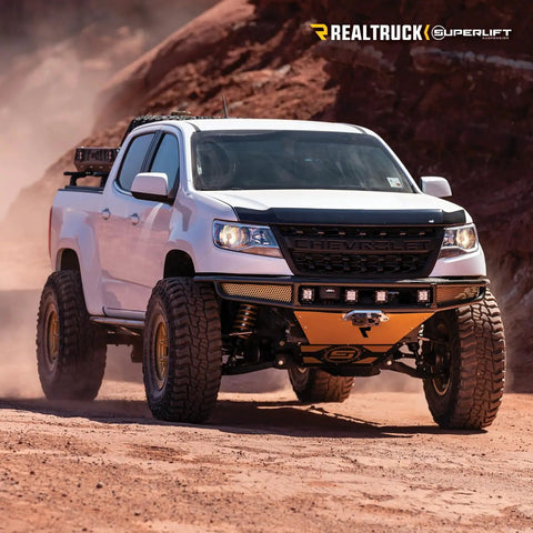 Chevy Colorado with Superlift 1.25 Inch Leveling Kit For Chevy Colorado And GMC Canyon With Strut Spacers Easy Bolt On Lift 2015 To 2022 Fit Does Not Fit ZR2 Models Made In USA Performance Ready Suspension Upgrade For All Terrain And Daily Driving on sandy terrain