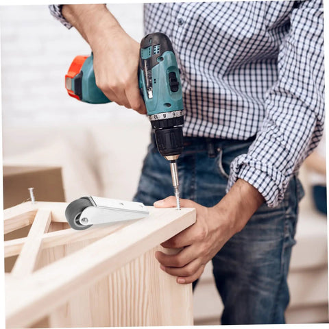 Heavy Duty Rock Solid Sliding Door Caster Wheel With Galvanized Steel Pulley For Barn And Wardrobe Tracks Featuring Dead Quiet Rollers And No Hassle Installation being installed with a power drill.