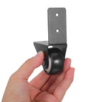 Hand holding an 8 Piece L Shaped Plate Caster for Furniture and Luggage with Rubber Wheels, Bottom Mount Fixed Caster