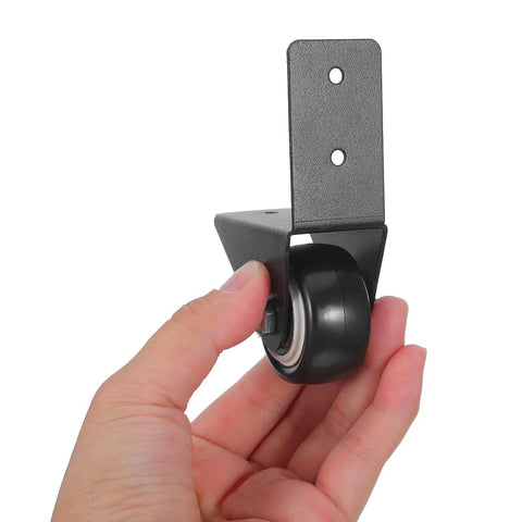 Hand holding an 8 Piece L Shaped Plate Caster for Furniture and Luggage with Rubber Wheels, Bottom Mount Fixed Caster