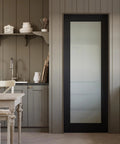 32 By 80 Black Door Slab With Frosted Glass Interior Panel in a kitchen setting, Shaker Style for sliding barn look.