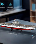 Must Have Battleship Building Set For Adults And Teens 14 Plus Massive 1883 Piece USS CV 6 Enterprise Warship Model Kit For Collectors And Display Ideal Navy Buff Birthday Gift showing ship dimensions on table.