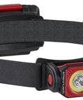 Twin Task 300-Lumen Headlamp With 3AA Batteries, compact black and red design, rubber hard-hat strap, front view