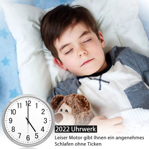 Child sleeping peacefully next to clock with text '2022 Uhrwerk', promoting quiet and smooth clock movement.