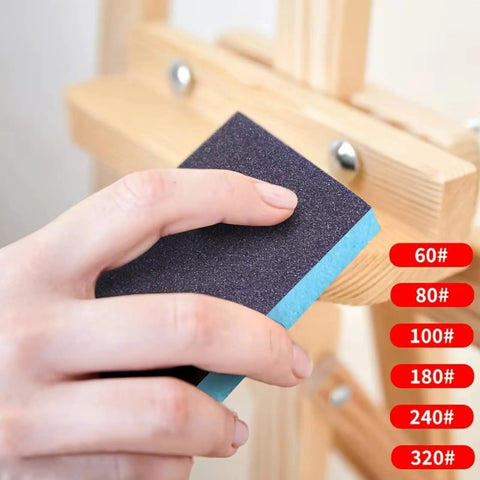 Top Shelf Workhorse Sanding Sponge Set Six Piece Kit With 60 To 320 Grit Double Sided Blocks Wet Dry Use On Wood Metal Auto Body Smooth Out Scratches And Blemishes Daily, hand holding sponge with grit labels.