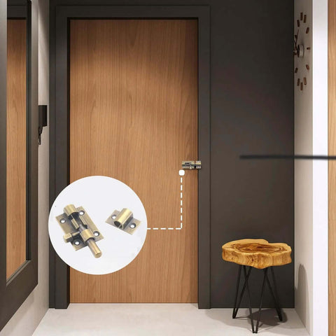 Interior view of a wooden door with installed Beefy 1.5 Inch Gate Latch 2 Pack Brass Sliding Barrel Bolt Lock For Wood Fences Barn Doors Cabinets.