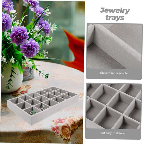 Sleek Three Piece Multi Compartment Jewelry Organizer Tray With Supple Velour Finish For Earrings Rings And Necklaces on a table.