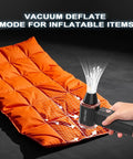 High Speed Cordless Air Duster 300000 RPM Turbo Blower with variable speed deflates an orange inflatable item.