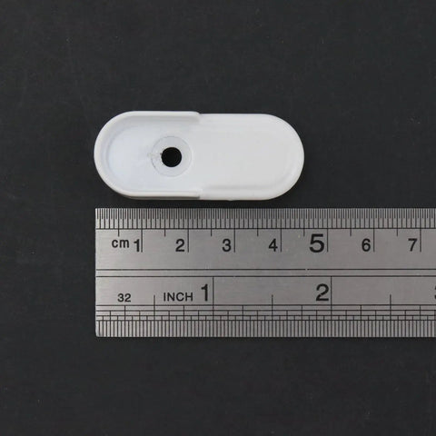 Oval Closet Rod End Supports 18 Pack White For Standard 15x30mm Flat Rods next to a ruler for size reference