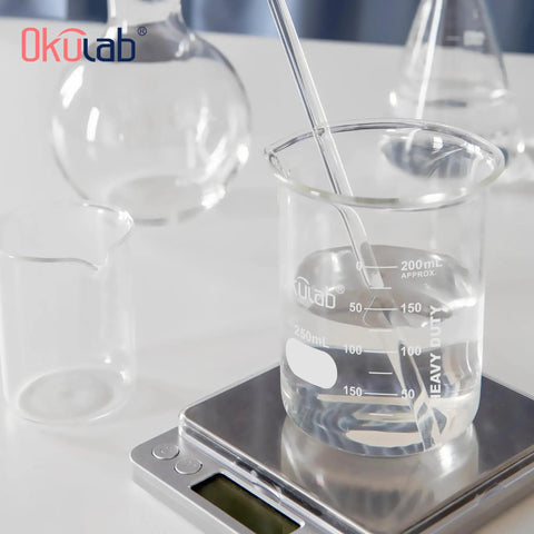 Heavy-Duty Glass Beaker 1000mL Thick-Walled 3.3 Borosilicate With Dual Scale Graduation on digital scale in lab