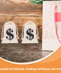 Beige Cotton Drawstring Gift Pouches With Money Sign For Cowboy Party Decor And Birthday Party Favors, 10x15cm displayed.