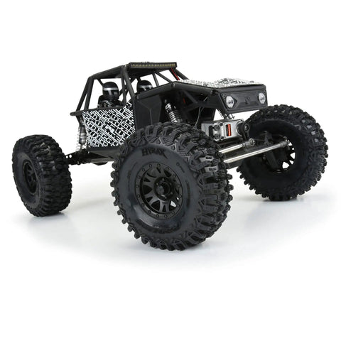 RC car with Hyrax LP G8 2.2 Crawler Tires for 1 by 10 RC Front and Rear, stepped block tread, low profile, USA made, scale detail.