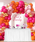 Hot Pink And Orange Balloon Arch Kit With Metallic Gold Confetti Balloons For Weddings Baby Showers And Birthday Parties Includes 37 Pink Balloons 37 Orange Balloons 35 Pastel Pink Balloons And 15 Gold Confetti Balloons In 5 And 10 Inch Sizes, shown as event backdrop.