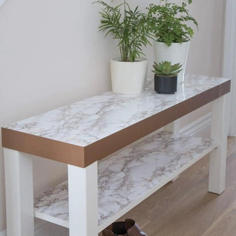 Table covered with Self-Adhesive Brown Marble Film For Walls Cabinets And Furniture Easy Peel And Stick Decor Wrap Budget Friendly DIY Renovations 26.5 X 78.7 Inches Easy To Apply.