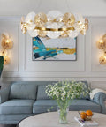 Living room with set of 2 gold wall sconces, brass finish, glass shade, modern decor, cozy ambient glow