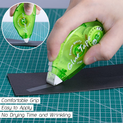 Person using 12 Pack Double Sided Tape Roller For Scrapbooking And Crafts, Permanent Adhesive Dispenser on black paper