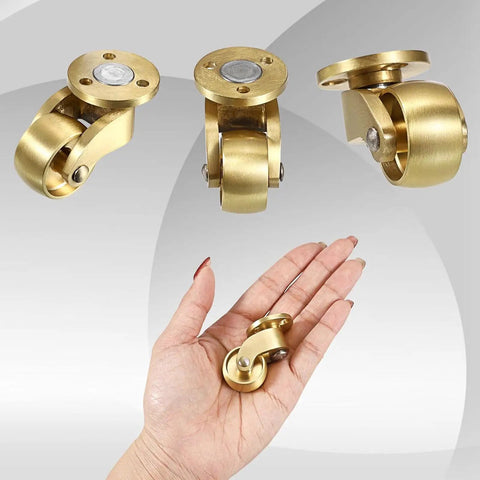 Sturdy Brass Casters Set For Moving Trunks Boxes Workbenches And Cabinets With Silent Swivel Wheels shown in hand for scale