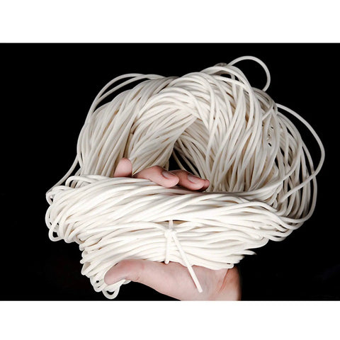 Top-Tier Silicone Foam Round Sealing Strip 10M Long held in hand, flexible white cord for extreme heat protection up to 200C.