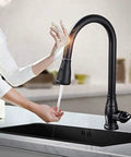 OGMOYT Matte Black Sensor Kitchen Faucet Sensitive Smart Touch Single Handle Mixer Tap in use washing hands.
