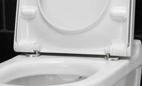 Slick Starck 3 White Toilet Seat with Smooth As Butter Soft Close Hinges, stainless steel mounting hardware detail.