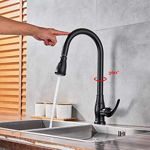 OGMOYT Matte Black Sensor Kitchen Faucet Sensitive Smart Touch Single Handle Mixer Tap in use with 360° rotating spout.